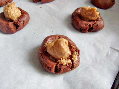 peanut butter stuffed double chocolate chip cookies