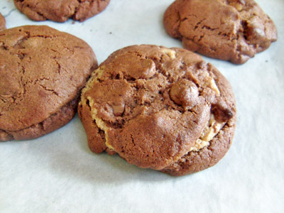 peanut butter stuffed double chocolate chip cookies
